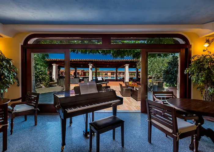 Hotel I Giardini Di Cala Ginepro 4*